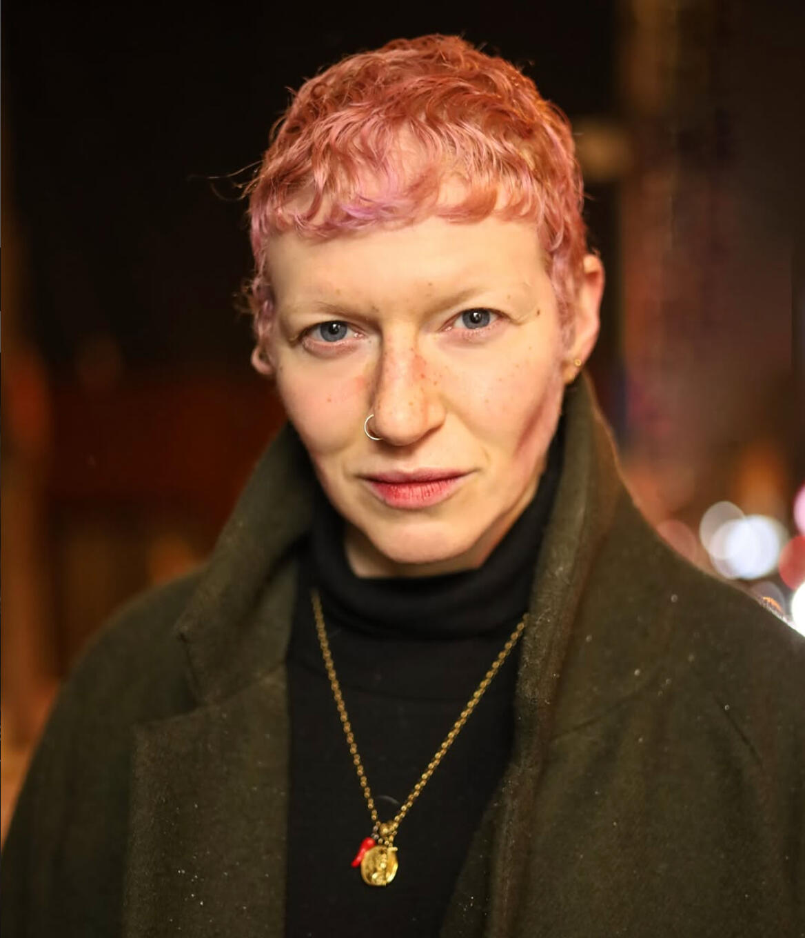 Actress and director Nadine Charleson sitting in a director chair